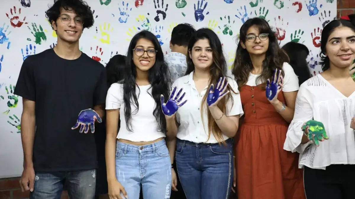 IIAD Students working with hands