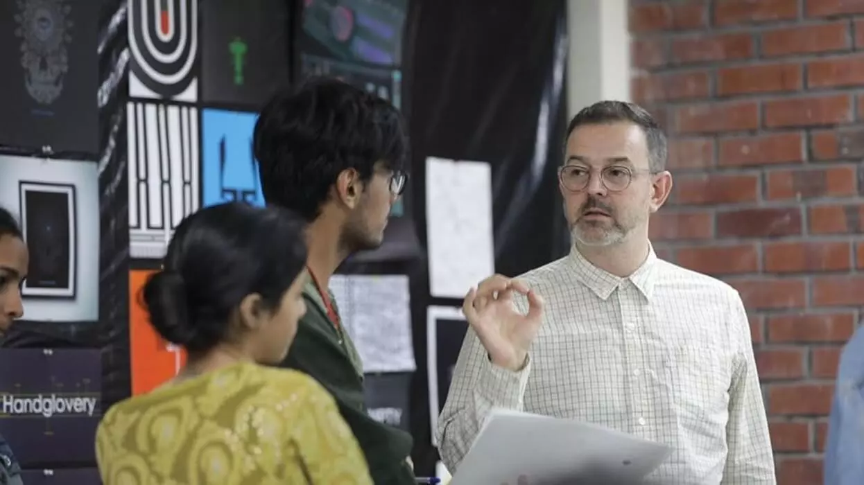 Jake Abrams, department of Illustration and Animation, Kingston University London interacts with the students on campus.