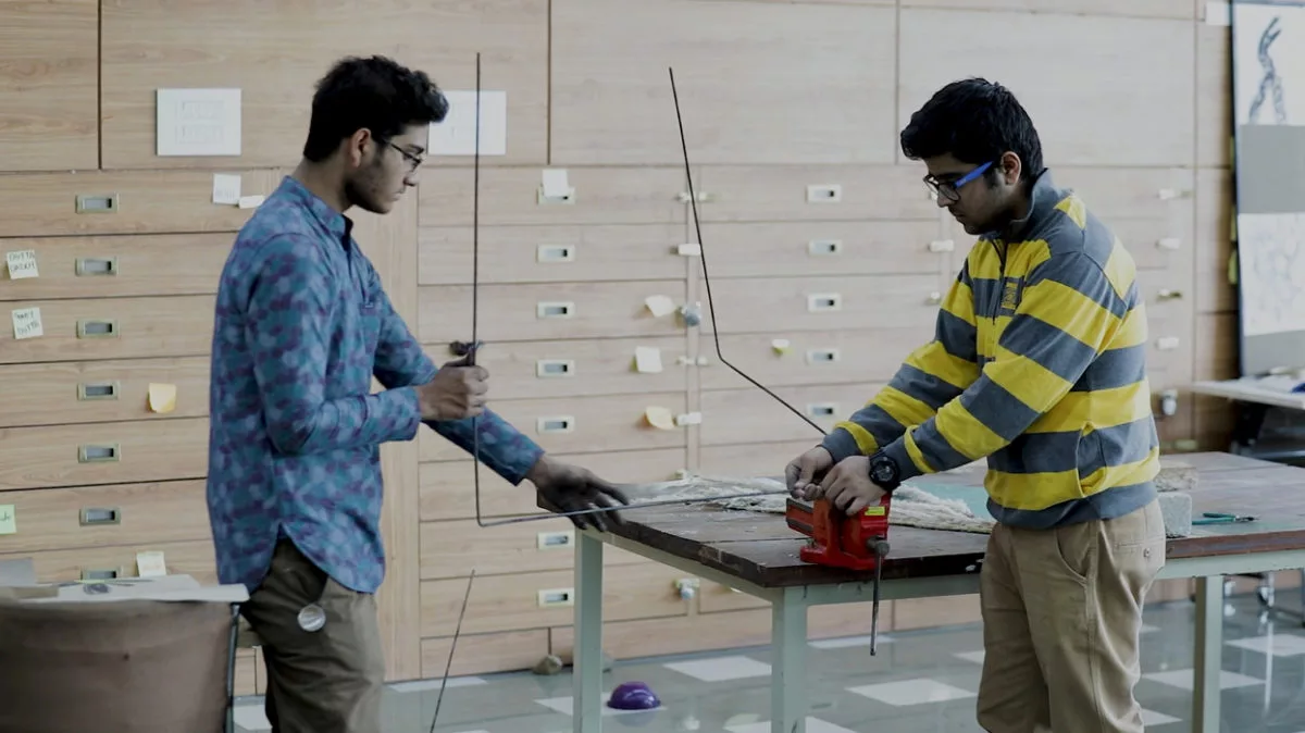 Student Working in Material Construction Lab for an IAD project at the IIAD