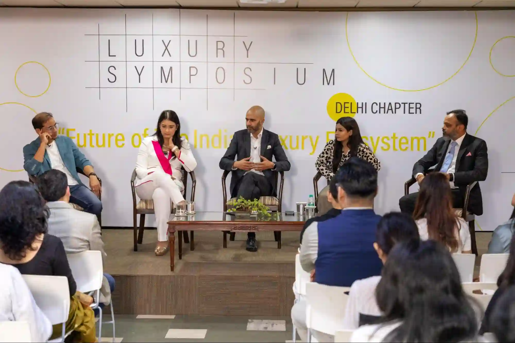 Panellists having a discussion at the Luxury Symposium at IIAD