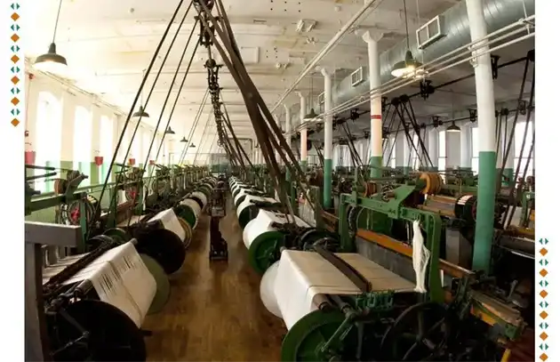 Vintage textile mill with weaving machines