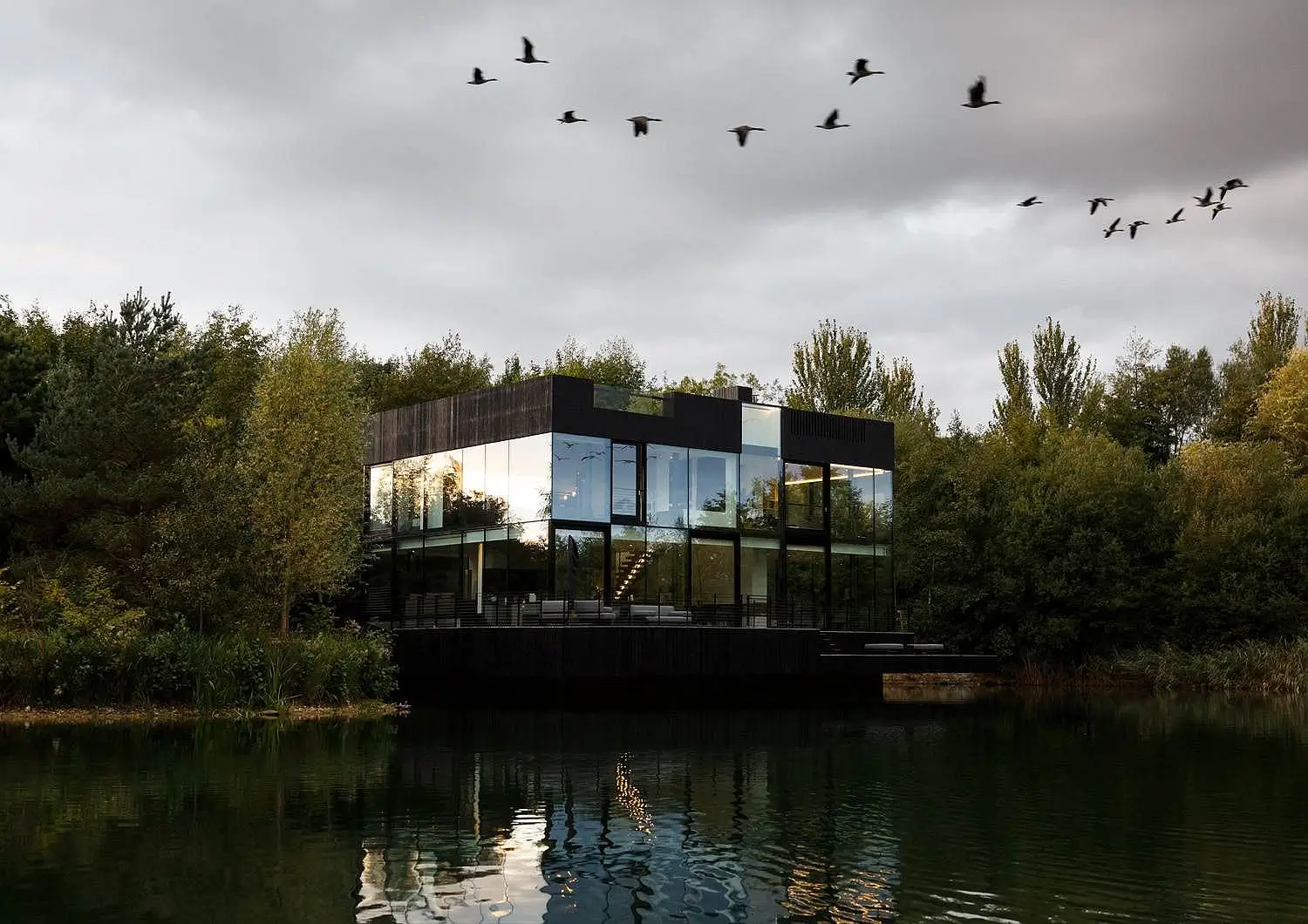 Eco-friendly lakeside house surrounded by nature
