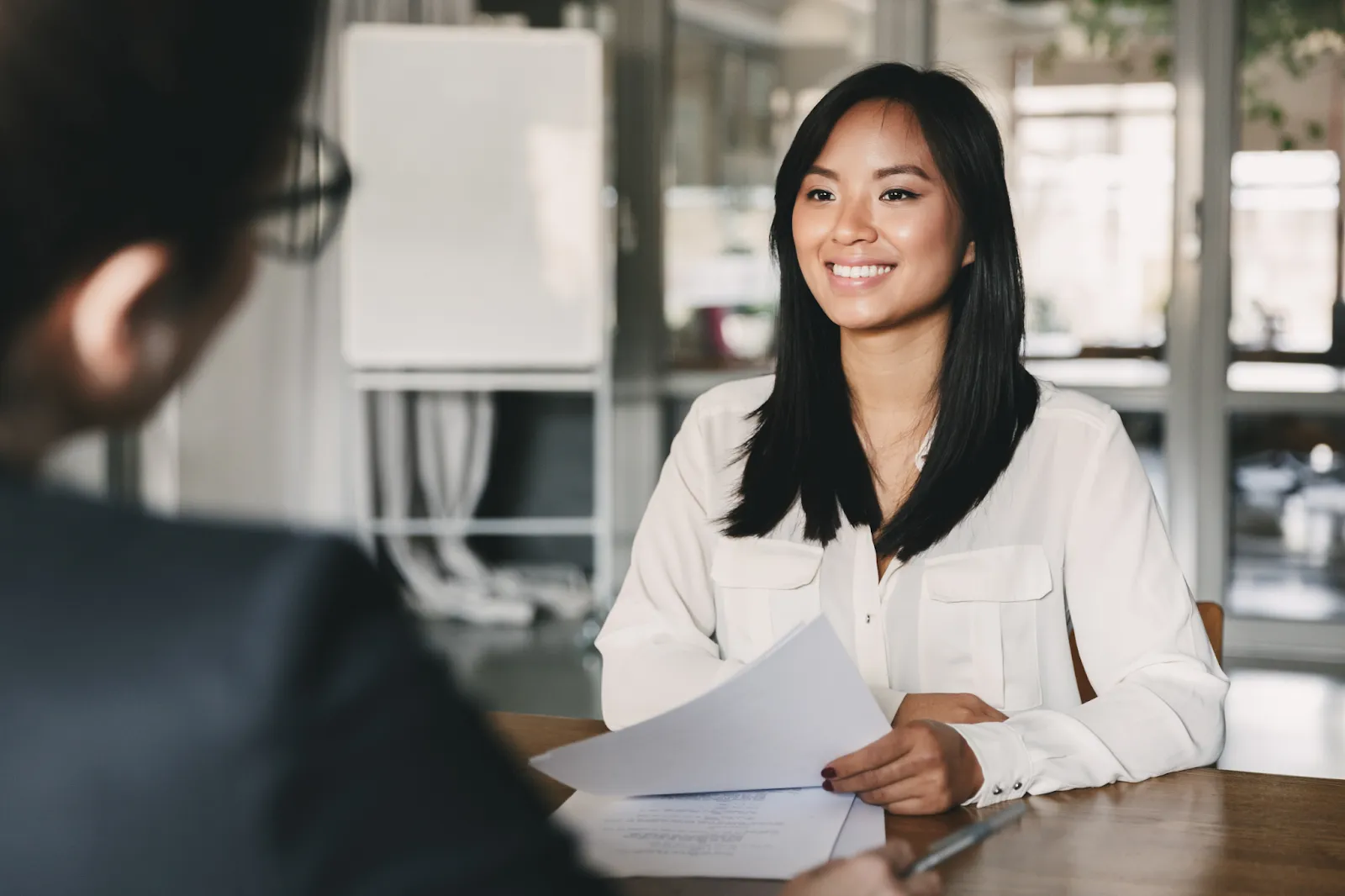 Fashion designer smiling during an interview
