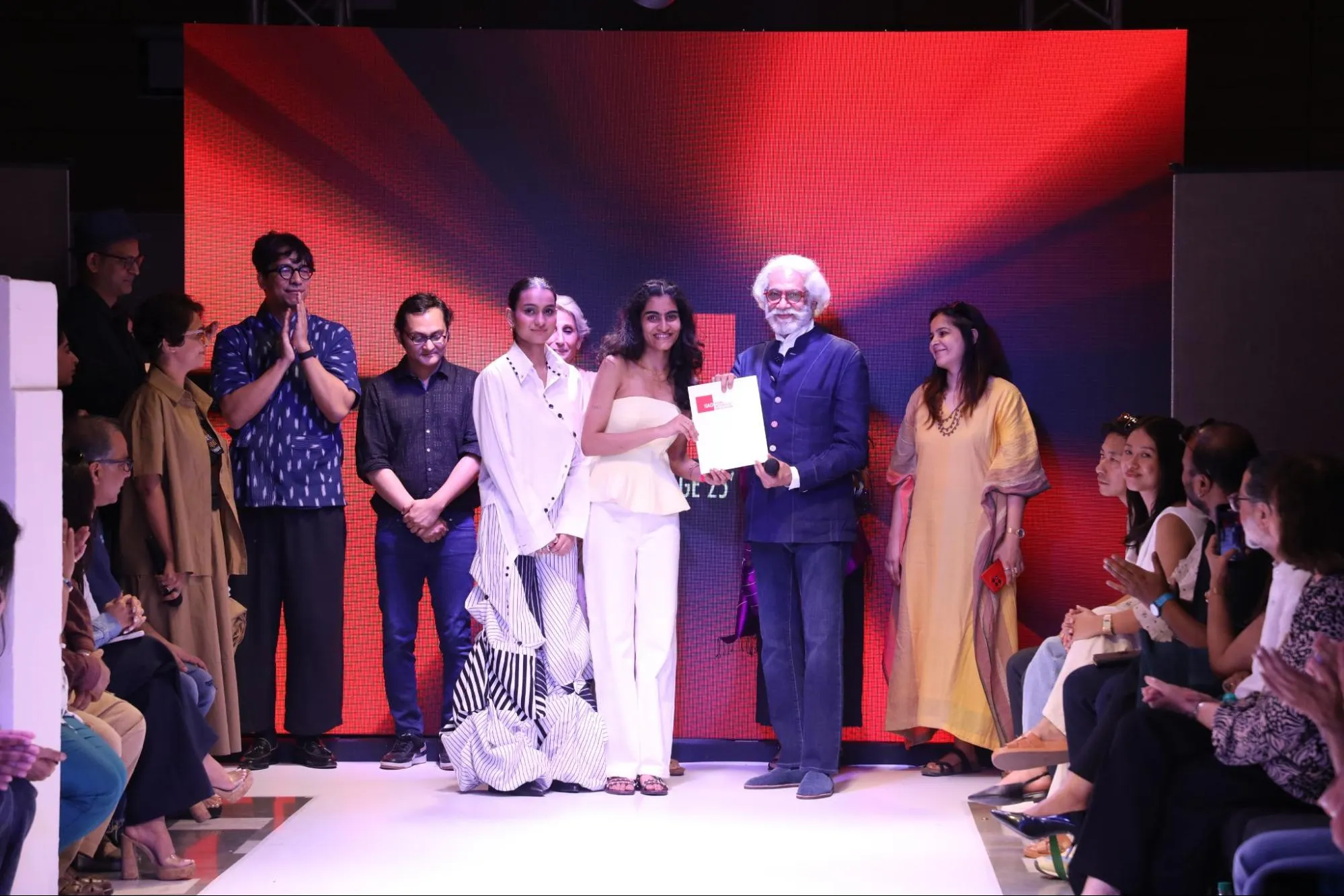 Sunil Sethi awarding graduates for their collections