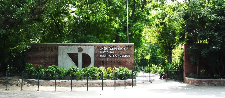 Entrance gate of the National Institute of Design (NID) Ahmedabad campus with greenery around
